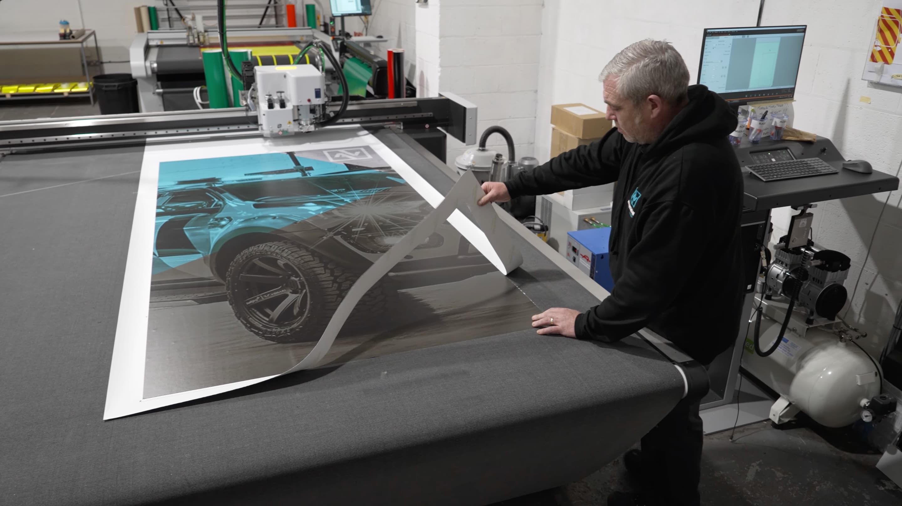 Large-format print production inside the SportVision and AllVision operation